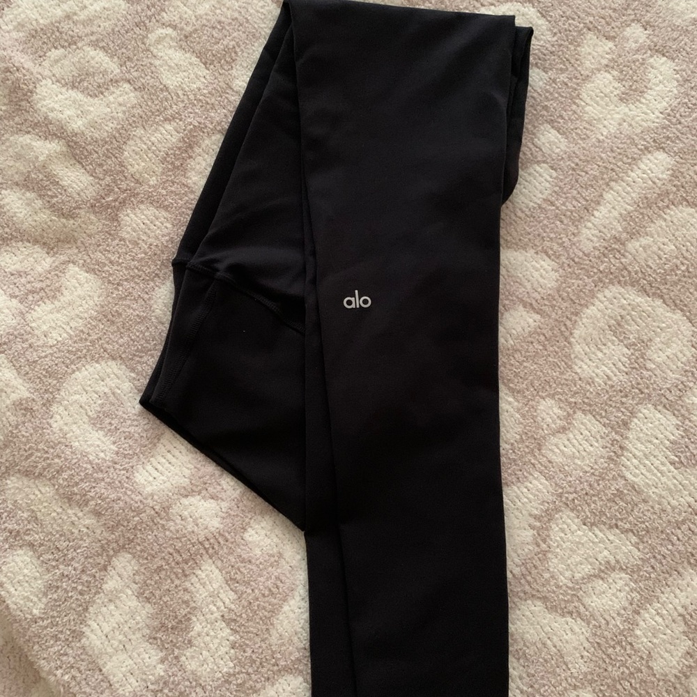 ALO Winter Warm High Waist black leggings.